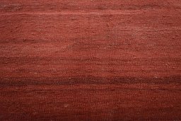 Backside of handmade New Modern Design rug showing knot structure and weave density