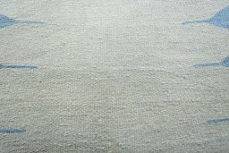 Backside of handmade New Modern Design rug showing knot structure and weave density