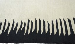 Close-up detail of New Modern Design rug from Iran / Persia showing Wool weave