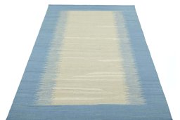 Close-up detail of New Modern Design rug from Iran / Persia showing Wool weave
