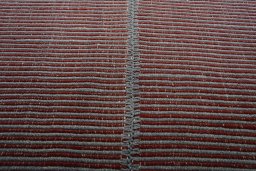Backside of handmade New Modern Design rug showing knot structure and weave density