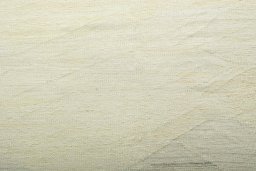 Backside of handmade New Modern Design rug showing knot structure and weave density