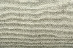 Backside of handmade New Modern Design rug showing knot structure and weave density