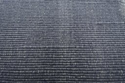 Backside of handmade New Modern Design rug showing knot structure and weave density