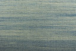 Backside of handmade New Modern Design rug showing knot structure and weave density