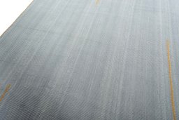 Surface texture of New Modern Design rug with natural Wool and intricate pattern