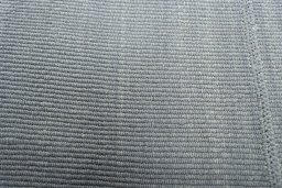 Backside of handmade New Modern Design rug showing knot structure and weave density