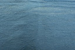 Backside of handmade New Modern Design rug showing knot structure and weave density