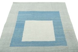 Close-up detail of New Modern Design rug from Iran / Persia showing Wool weave
