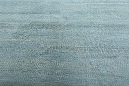 Backside of handmade New Modern Design rug showing knot structure and weave density