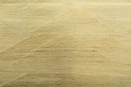 Backside of handmade New Modern Design rug showing knot structure and weave density