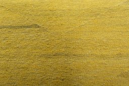 Backside of handmade New Modern Design rug showing knot structure and weave density
