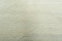 Backside of handmade New Modern Design rug showing knot structure and weave density