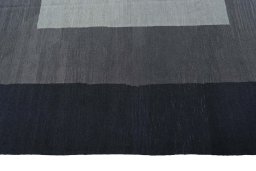 Close-up detail of New Modern Design rug from Iran / Persia showing Wool weave