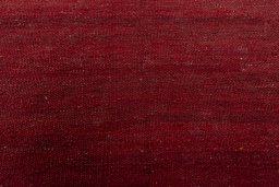 Backside of handmade New Modern Design rug showing knot structure and weave density