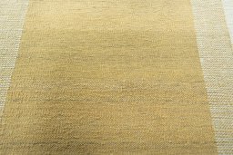 Backside of handmade New Modern Design rug showing knot structure and weave density