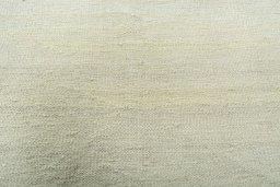Backside of handmade New Modern Design rug showing knot structure and weave density