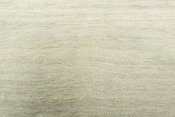 Backside of handmade New Modern Design rug showing knot structure and weave density