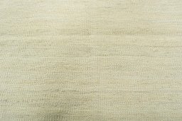 Backside of handmade New Modern Design rug showing knot structure and weave density