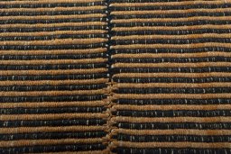 Backside of handmade New Modern Design rug showing knot structure and weave density