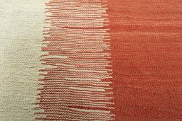 Backside of handmade New Modern Design rug showing knot structure and weave density