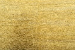 Backside of handmade New Modern Design rug showing knot structure and weave density