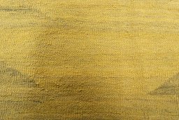 Backside of handmade New Modern Design rug showing knot structure and weave density