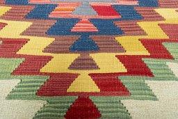 Backside of handmade New Modern Design rug showing knot structure and weave density