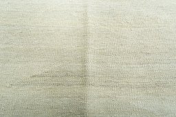 Backside of handmade New Modern Design rug showing knot structure and weave density