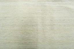 Backside of handmade New Modern Design rug showing knot structure and weave density