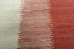 Backside of handmade New Modern Design rug showing knot structure and weave density