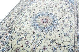 Backside of handmade 2000s Nain rug showing knot structure and weave density