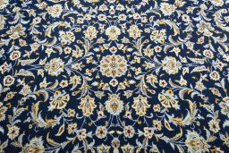 Central medallion detail of 2000s Kashan rug from Iran / Persia