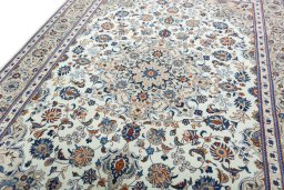 Backside of handmade 2000s Kashmar rug showing knot structure and weave density