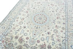 Backside of handmade 2000s Nain rug showing knot structure and weave density