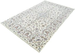 Corner detail of New Kashan rug showing border pattern and Wool pile