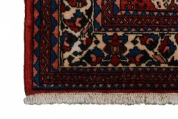 Backside of handmade 2000s Abadeh rug showing knot structure and weave density