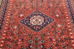 Surface texture of 2000s Abadeh rug with natural Wool and intricate pattern