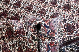 Corner detail of 1950s Abadeh rug showing border pattern and Wool pile