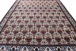 Backside of handmade 1950s Abadeh rug showing knot structure and weave density