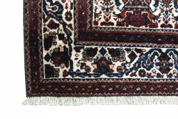 Full view of 1950s Abadeh rug from Iran / Persia, 298 × 203 cm in Beige tones
