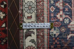 Surface texture of New Abadeh rug with natural Wool and intricate pattern