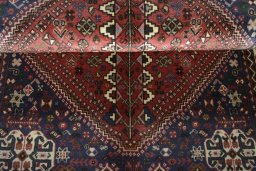 Corner detail of 2000s Abadeh rug showing border pattern and Wool pile