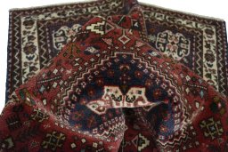 Close-up detail of 2000s Abadeh rug from Iran / Persia showing Wool weave