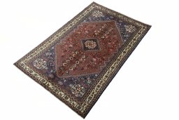 Corner detail of 2000s Abadeh rug showing border pattern and Wool pile