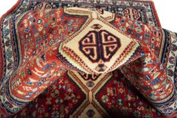 Corner detail of 2000s Abadeh rug showing border pattern and Wool pile