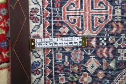 Close-up detail of 2000s Abadeh rug from Iran / Persia showing Wool weave