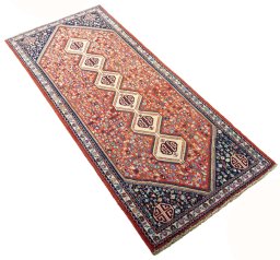 Close-up detail of 2000s Abadeh rug from Iran / Persia showing Wool weave