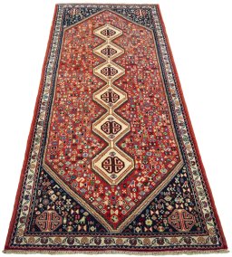 Surface texture of 2000s Abadeh rug with natural Wool and intricate pattern