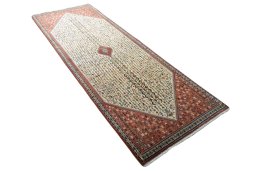 Close-up detail of New Abadeh rug from Iran / Persia showing Wool weave